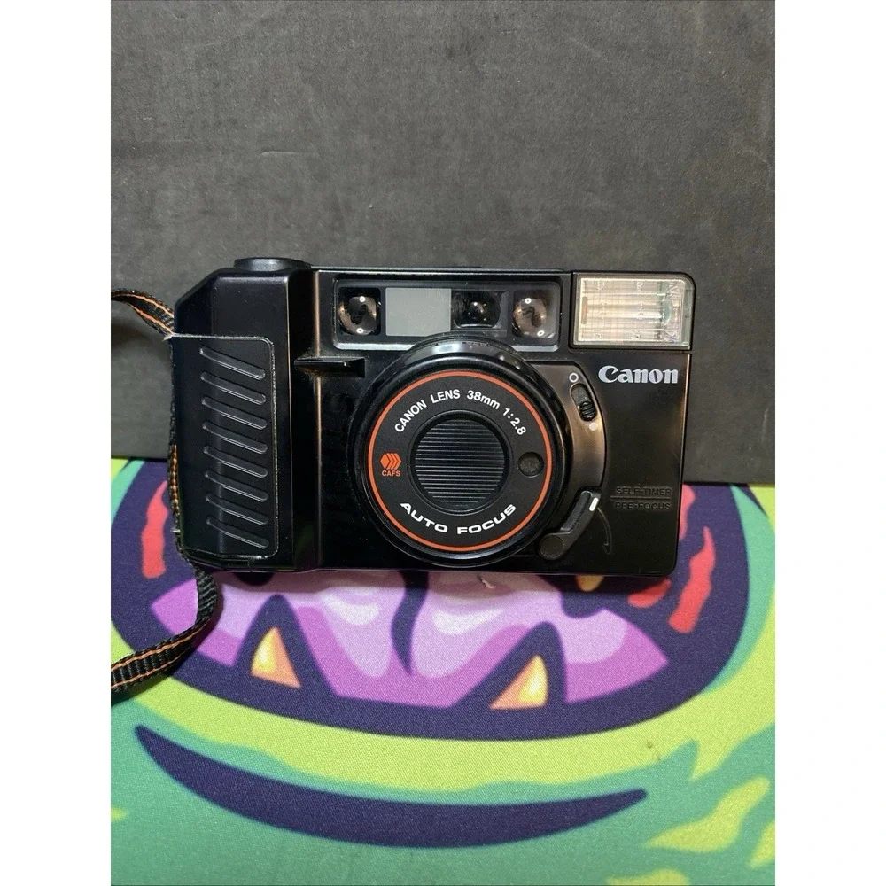 Vintage Canon Sure Shot W Strap 35mm Film Camera 38mm f/2.8 Nice B3